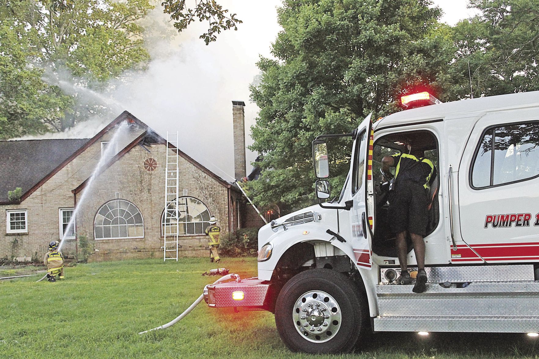 Midway house fire w truck